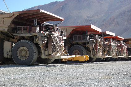 Mining trucks © iStockphoto/erlucho